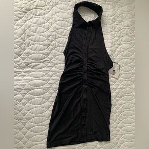 #27 NWT Halter style little black dress.    Size M